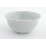 A Chinese bowl with banded foliate decoration to exterior and hand painted peached to interior.