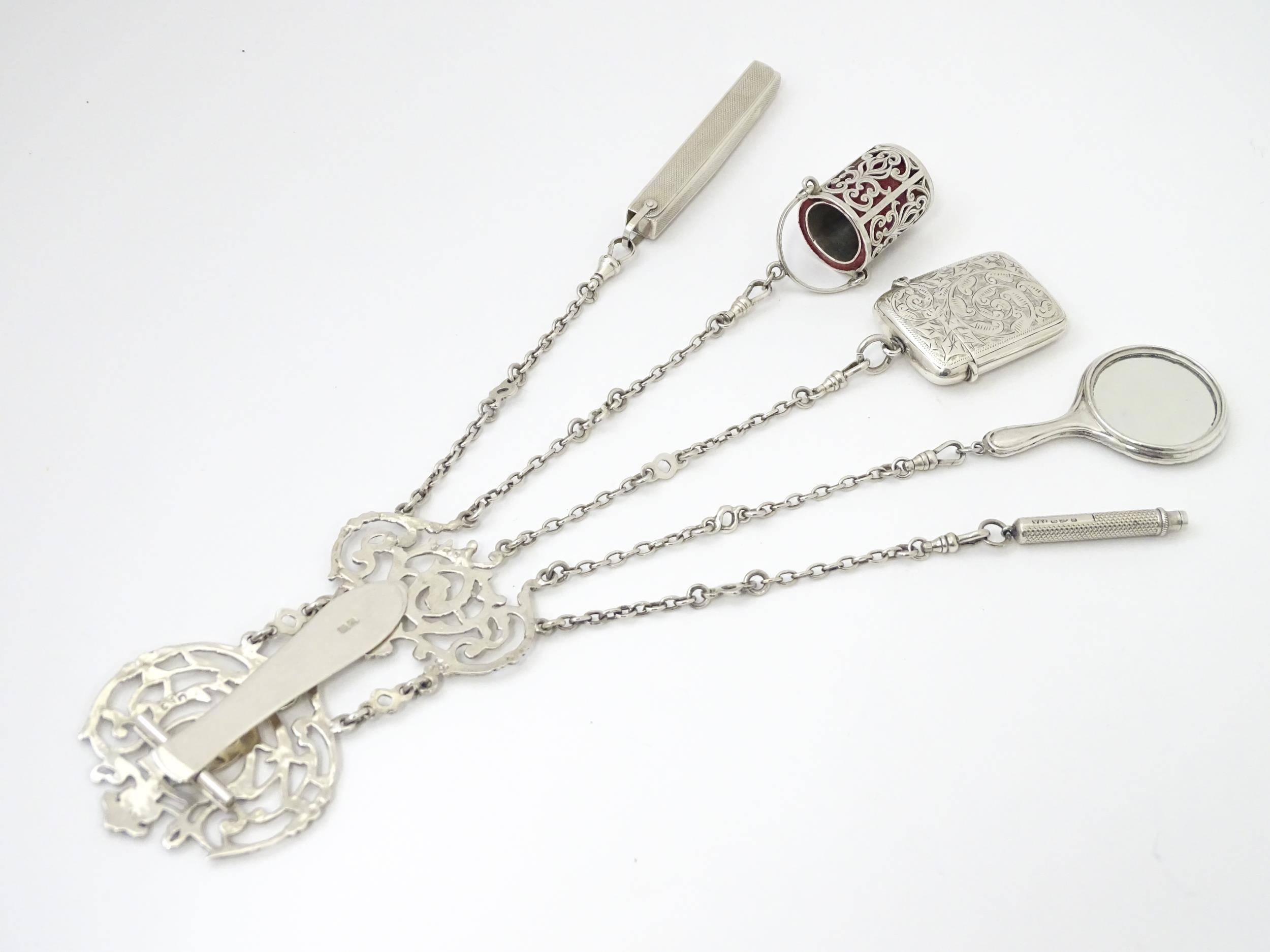 A silver chatelaine with openwork scrolling detail and having five chains, hallmarked Chester - Image 18 of 19