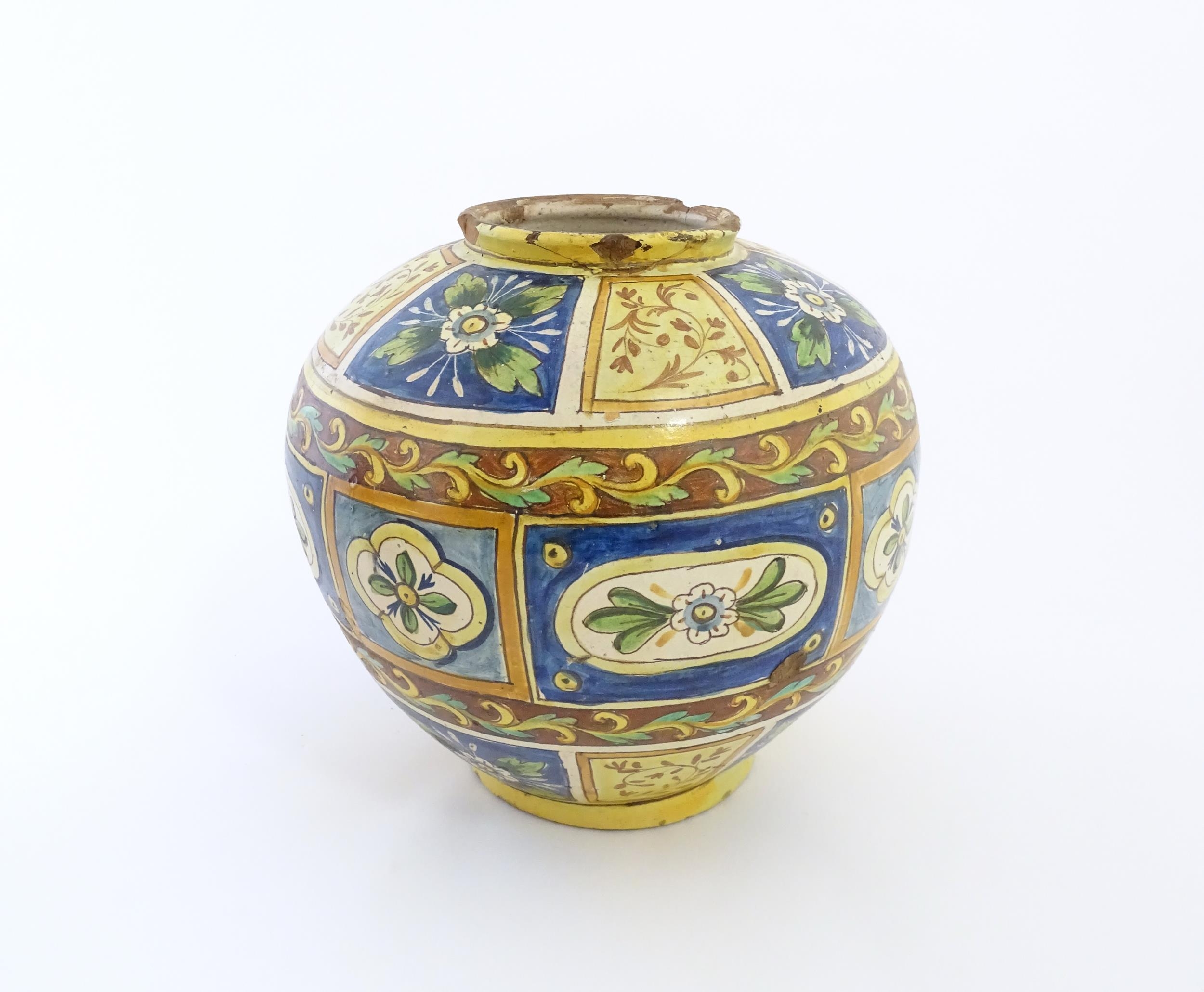 A Sicilian maiolica Bombola vase with panelled and banded decoration depicting flowers and - Image 6 of 10