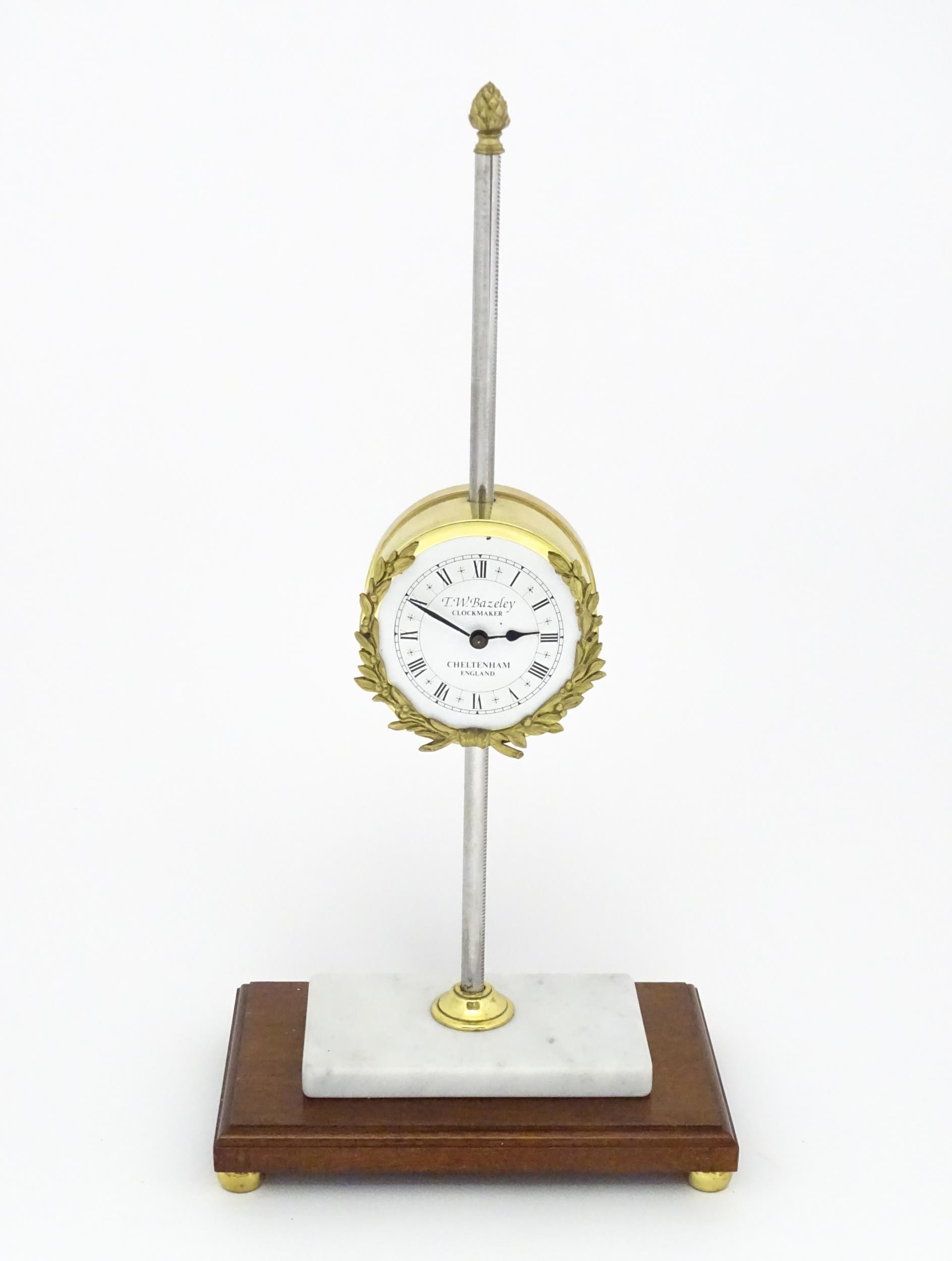 A 20thC gravity rack clock, the dial signed T. W. Bazeley, Clockmaker, Cheltenham, England within