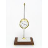 A 20thC gravity rack clock, the dial signed T. W. Bazeley, Clockmaker, Cheltenham, England within