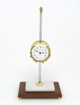 A 20thC gravity rack clock, the dial signed T. W. Bazeley, Clockmaker, Cheltenham, England within