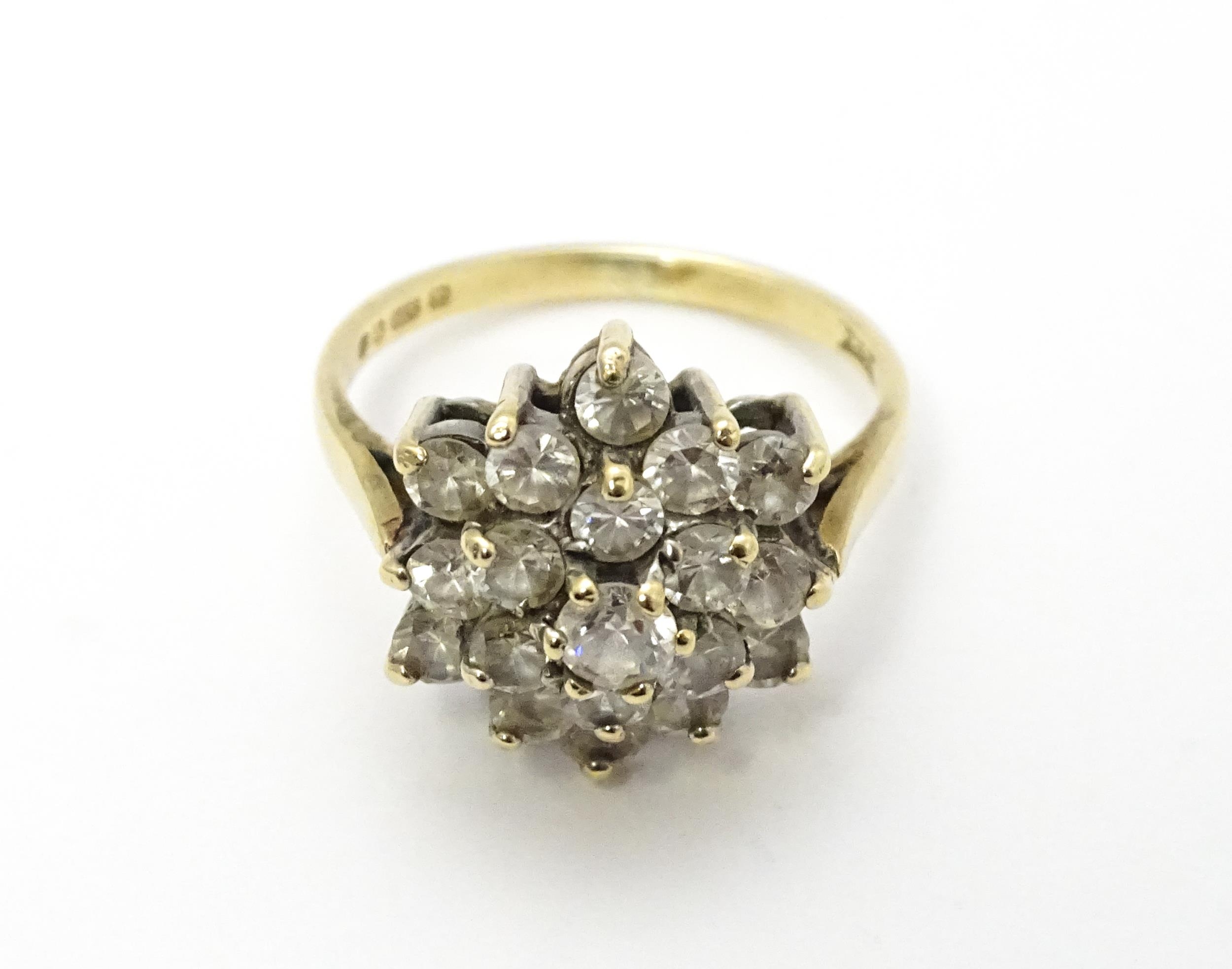 A 9ct gold ring set with diamonds in a floral cluster setting. Ring size approx. M Please Note - - Image 4 of 8
