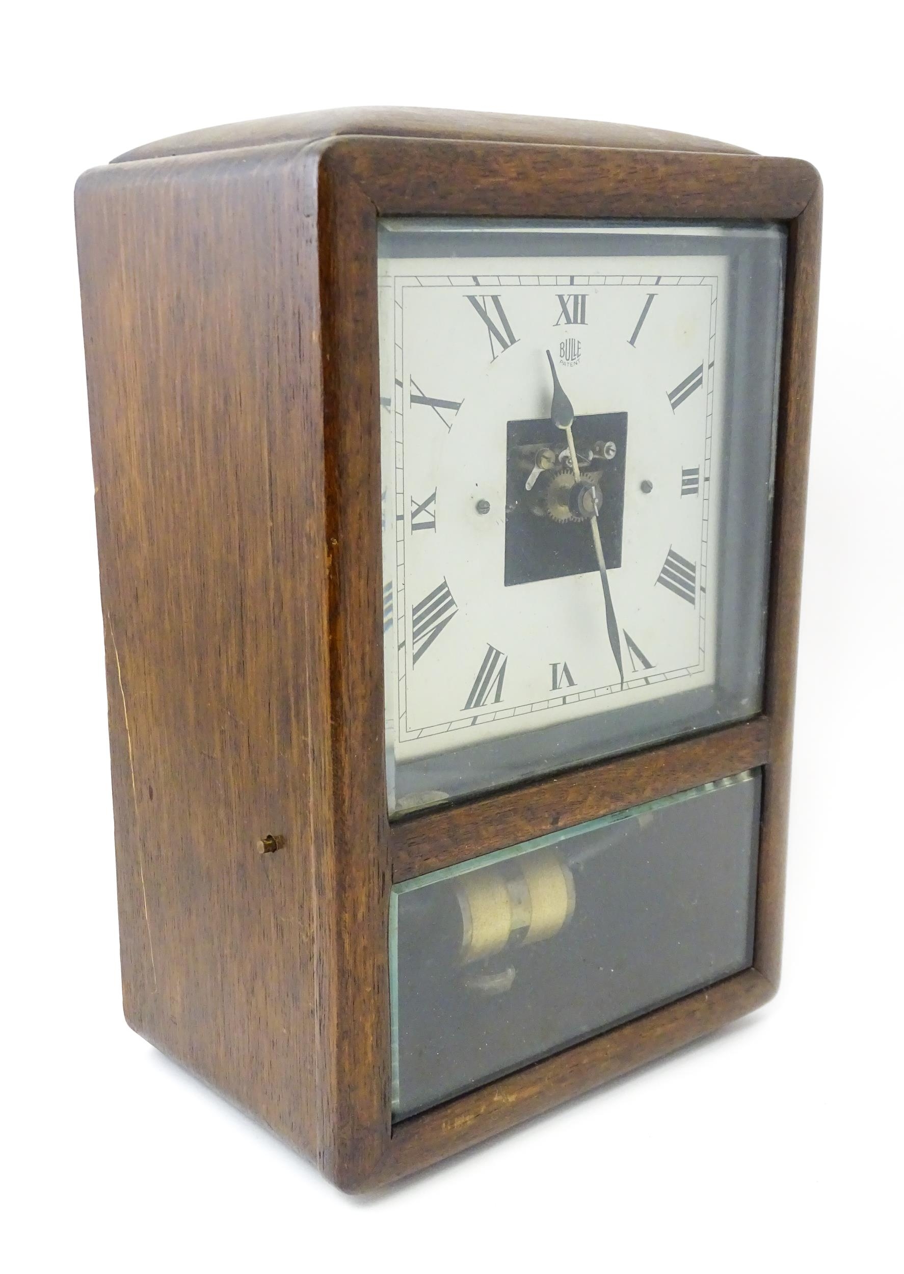 Bulle : A French Art Deco oak cased electric mantel clock by Bulle. The dial signed Bulle Patent - Image 3 of 9