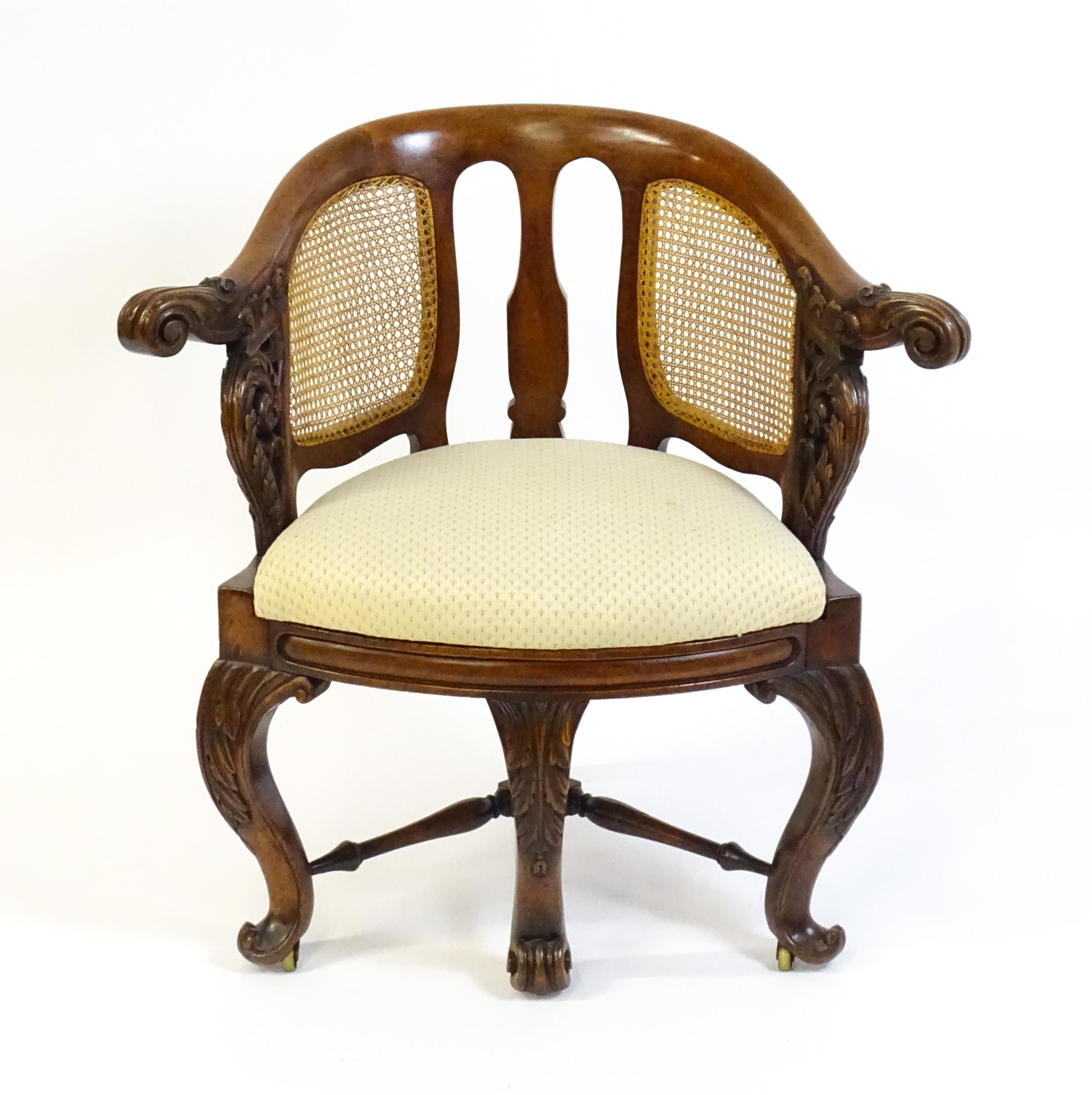 A mid 19thC mahogany Burgermeister chair, this continental chair having a bowed backrest terminating