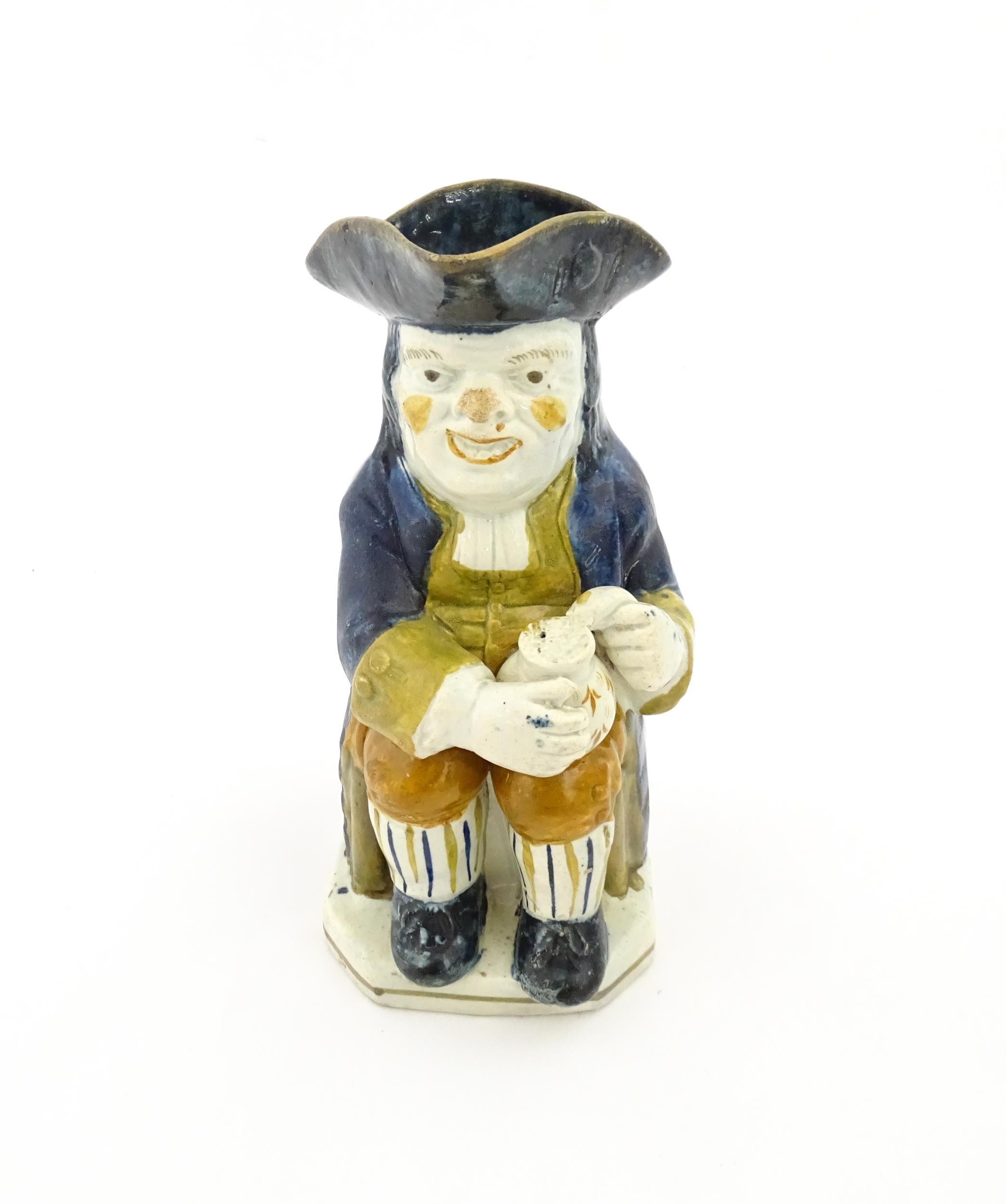 A 19thC Staffordshire pottery character Toby jug decorated in Pratt colours. Approx. 9 1/4" high - Image 3 of 6