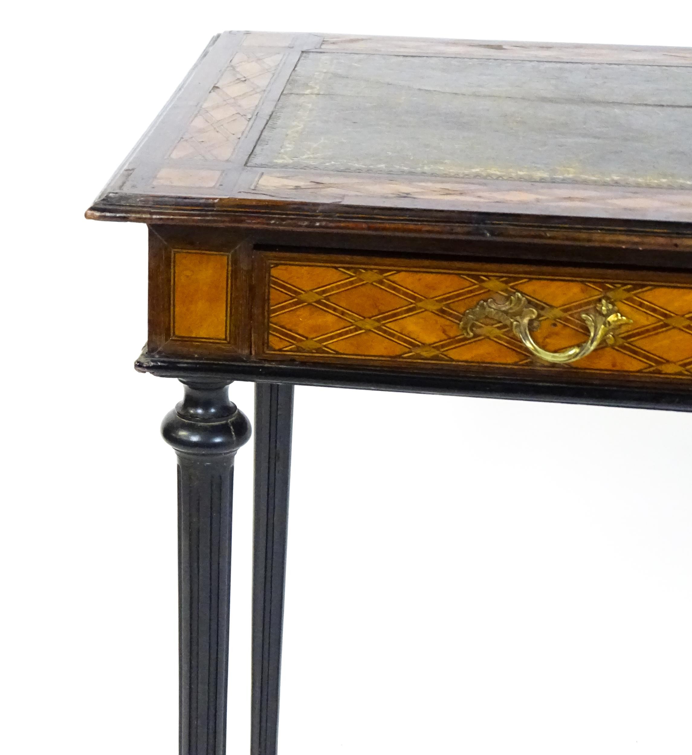 A 19thC side table with a satinwood inlaid top enclosing a gold tooled green leather top above a - Image 8 of 10