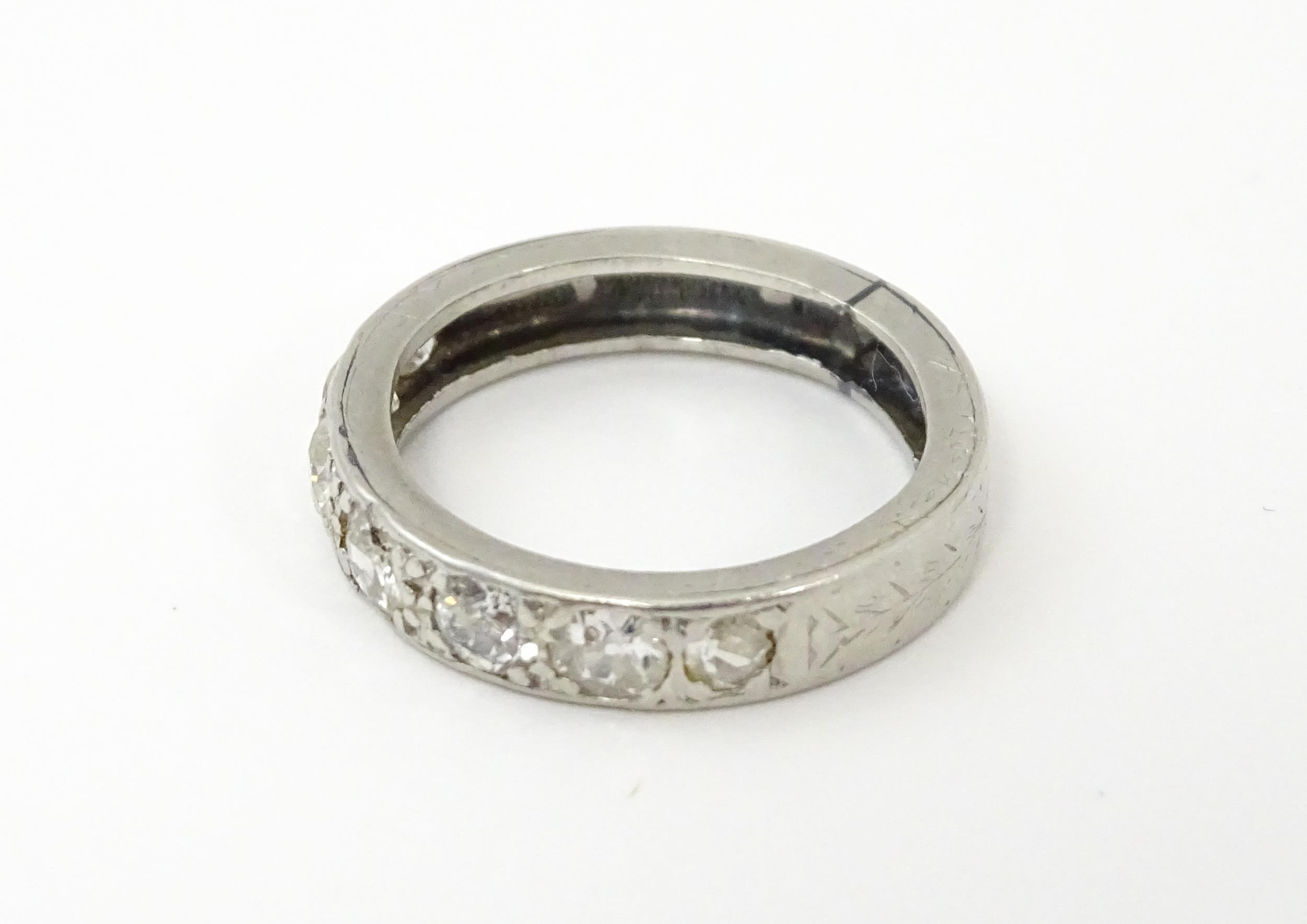 A diamond half eternity ring set with 7 diamonds. Ring size approx. L Please Note - we do not make - Image 6 of 9