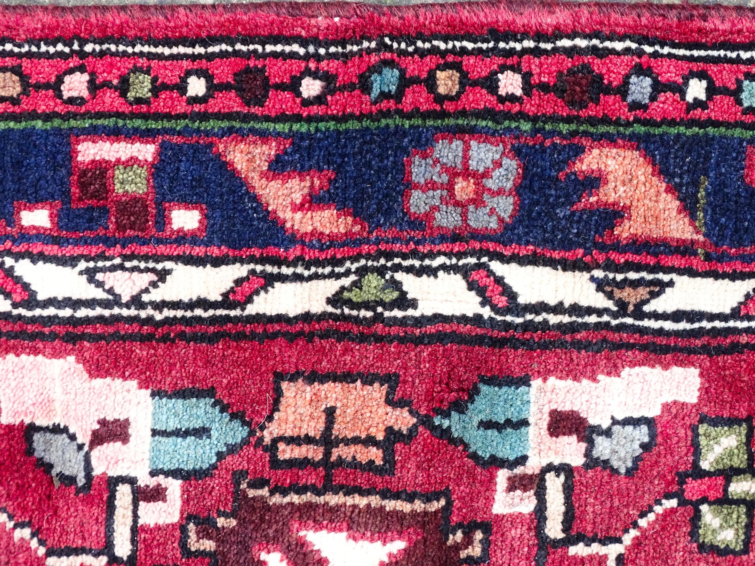 Carpet / Rug : A Persian Hamadan runner, the red ground with central cream ground medallion with - Image 6 of 8