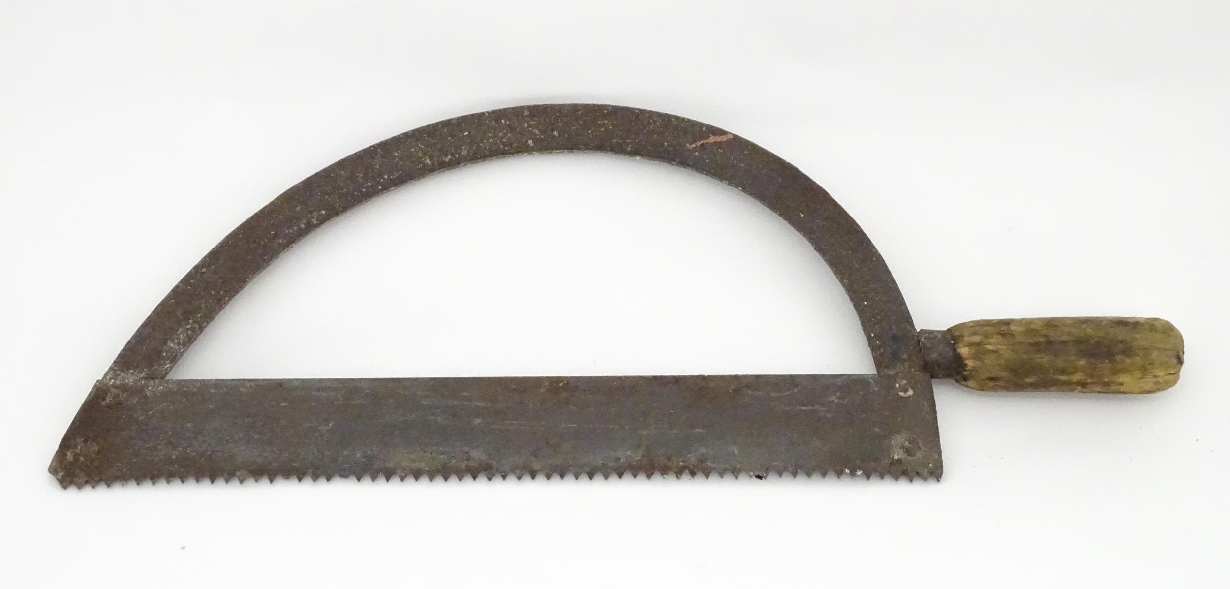 A 19thC bow saw , with arc frame and wooden handle, approx 23" long Please Note - we do not make - Image 4 of 6