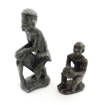 Ethnographic / Native / Tribal : An African soapstone carving modelled as a tribesman playing a