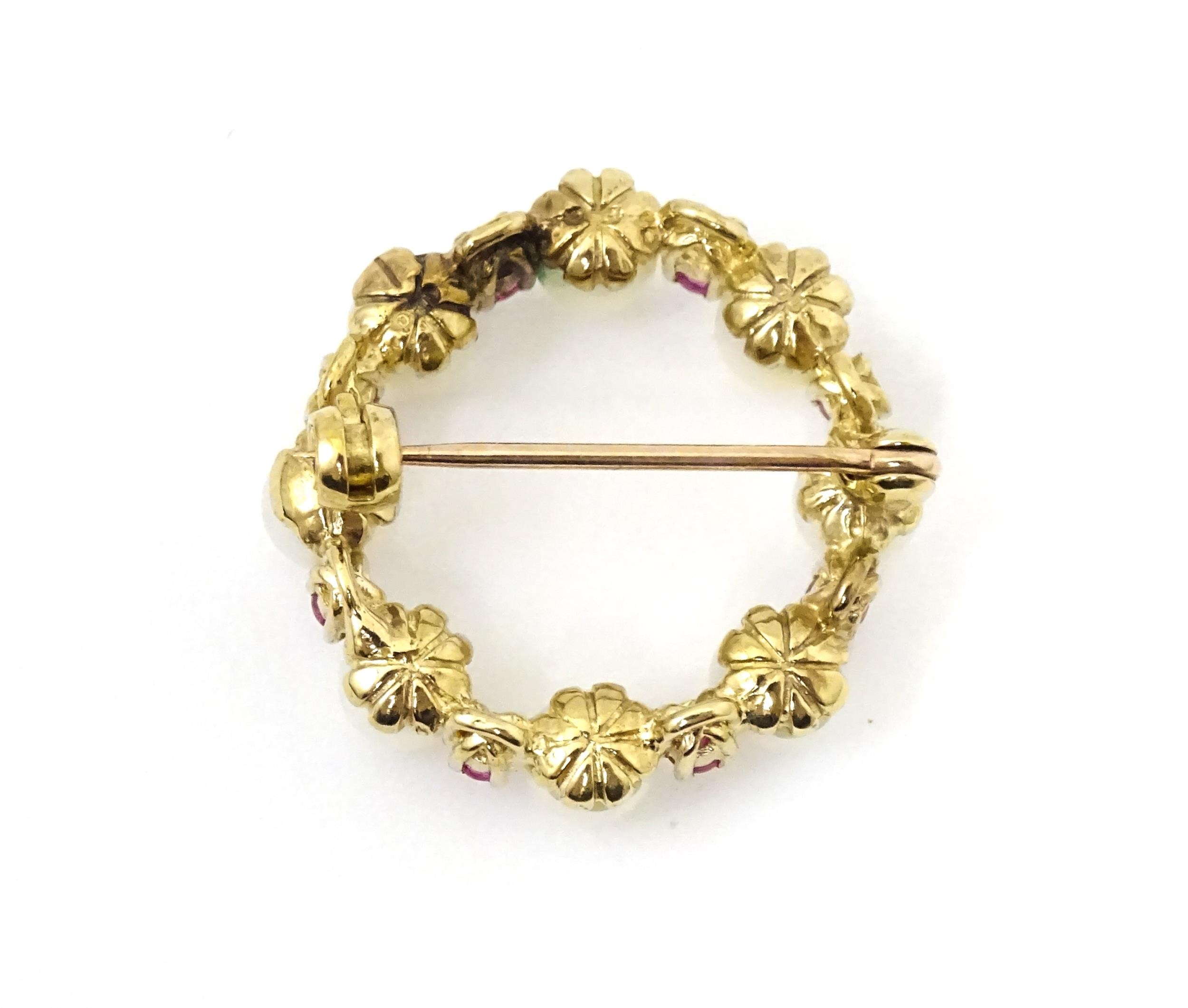 A 9ct gold pendant / brooch of circular set with pearls and round cut rubies. Approx 1" wide - Image 5 of 9