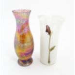 A milk glass vase with calla lily detail. Together with a vase decoration decorated in the Favrile