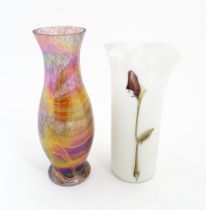 A milk glass vase with calla lily detail. Together with a vase decoration decorated in the Favrile