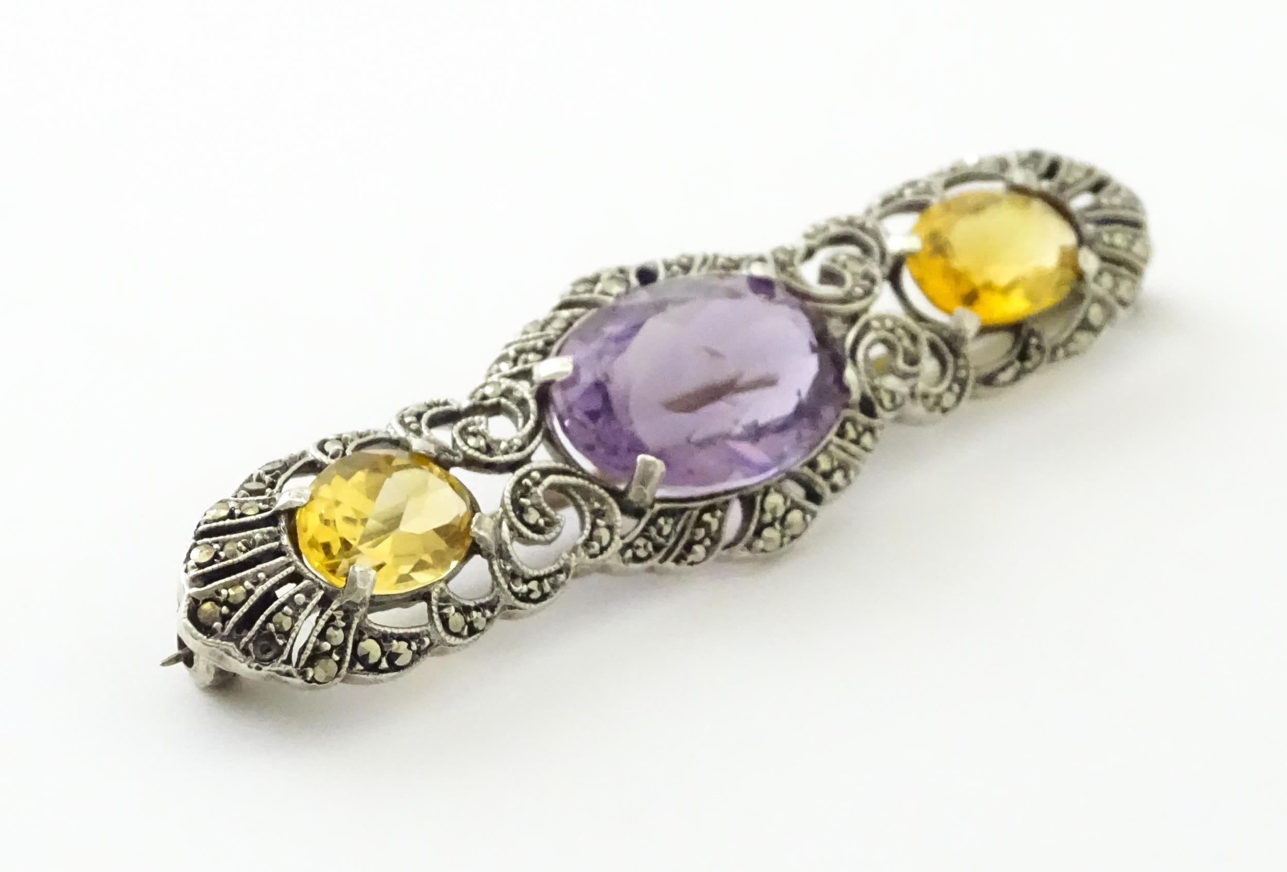 A silver brooch set with amethyst, citrine and marcasite. Approx 2 1./4" wide Please Note - we do - Image 3 of 8