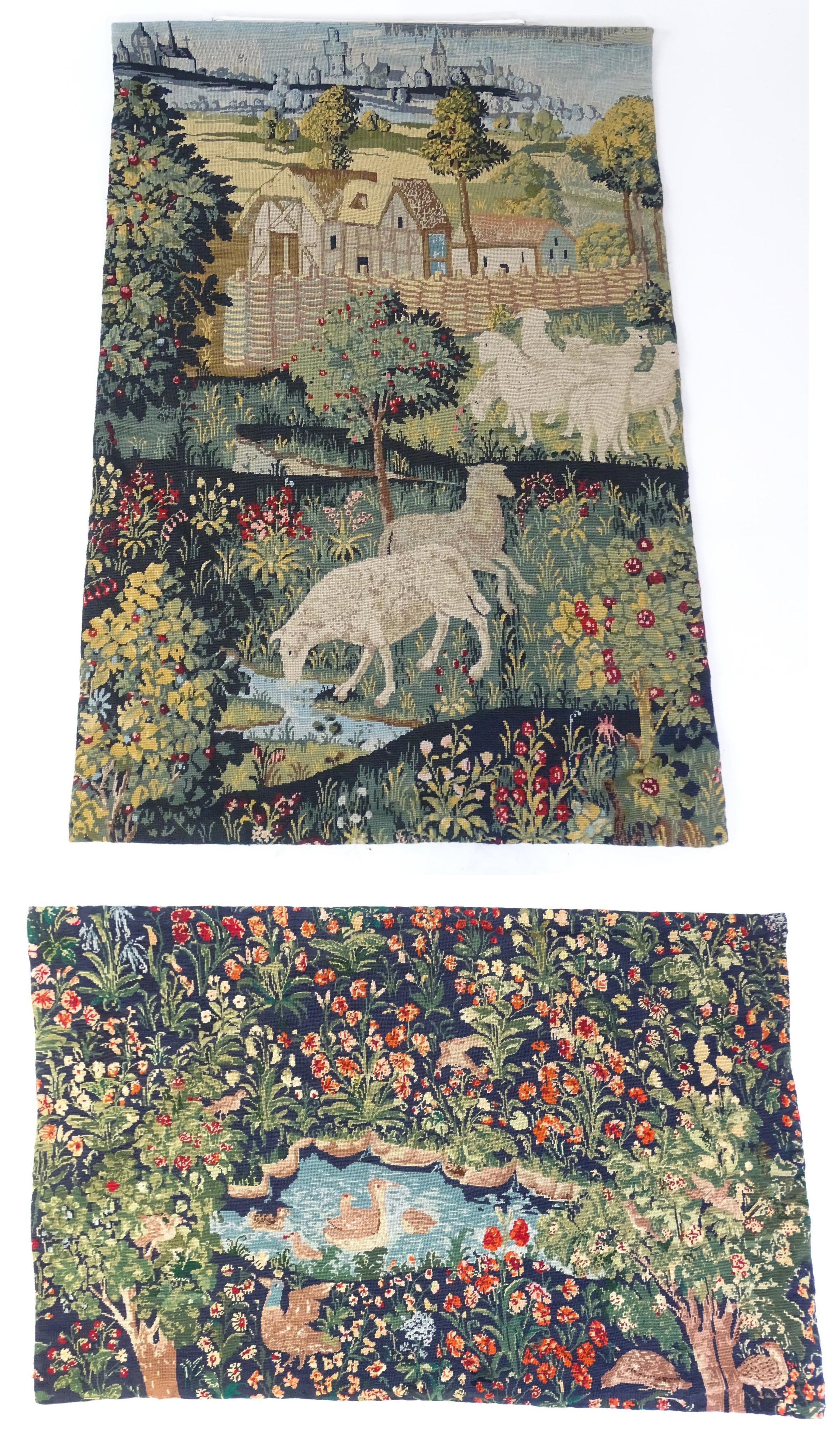 Two 20thC Continental tapestries one depicting sheep grazing with town beyond, the other depicting a