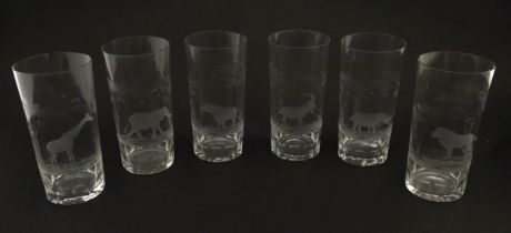 Six Rowland Ward highball glasses with engraved Safari animal detail. Unsigned. Approx. 5 1/2"