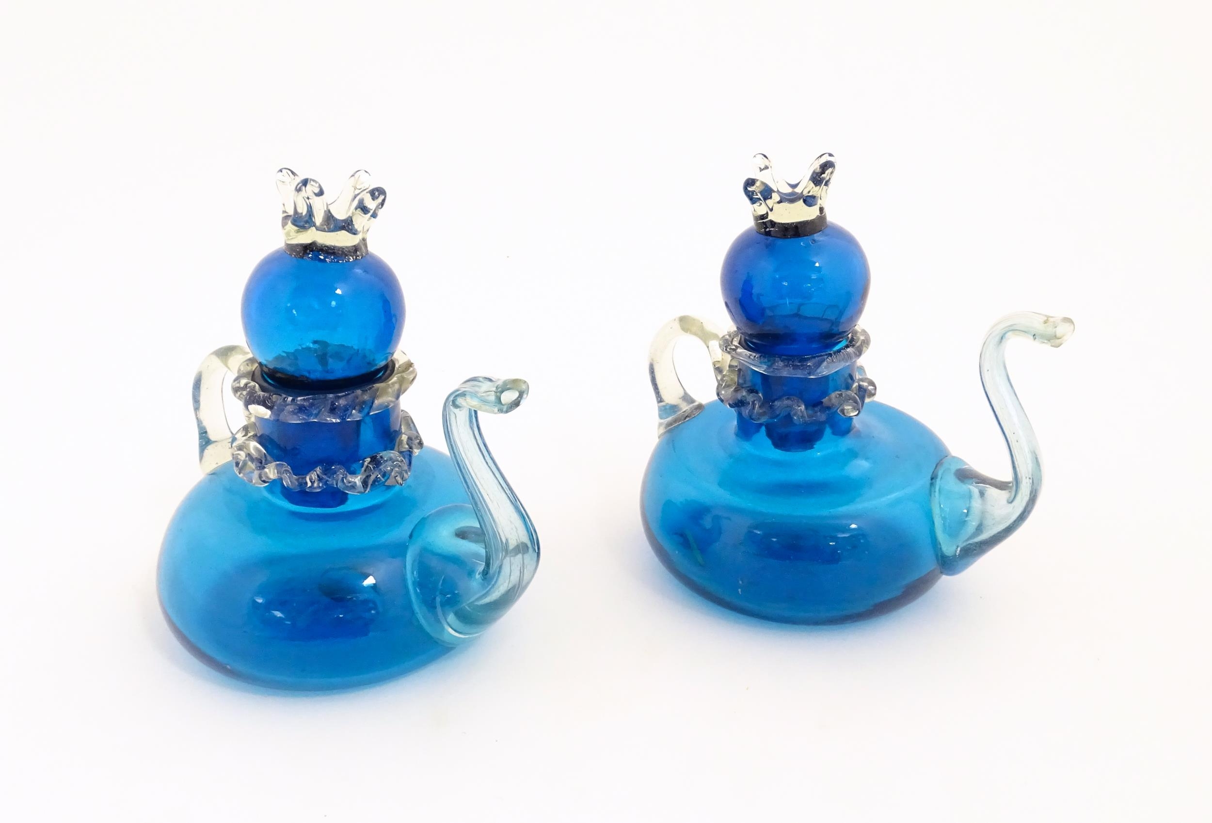 An unusual pair of turquoise glass oil / vinegar bottles of teapot form, the lids surmounted by - Image 8 of 11