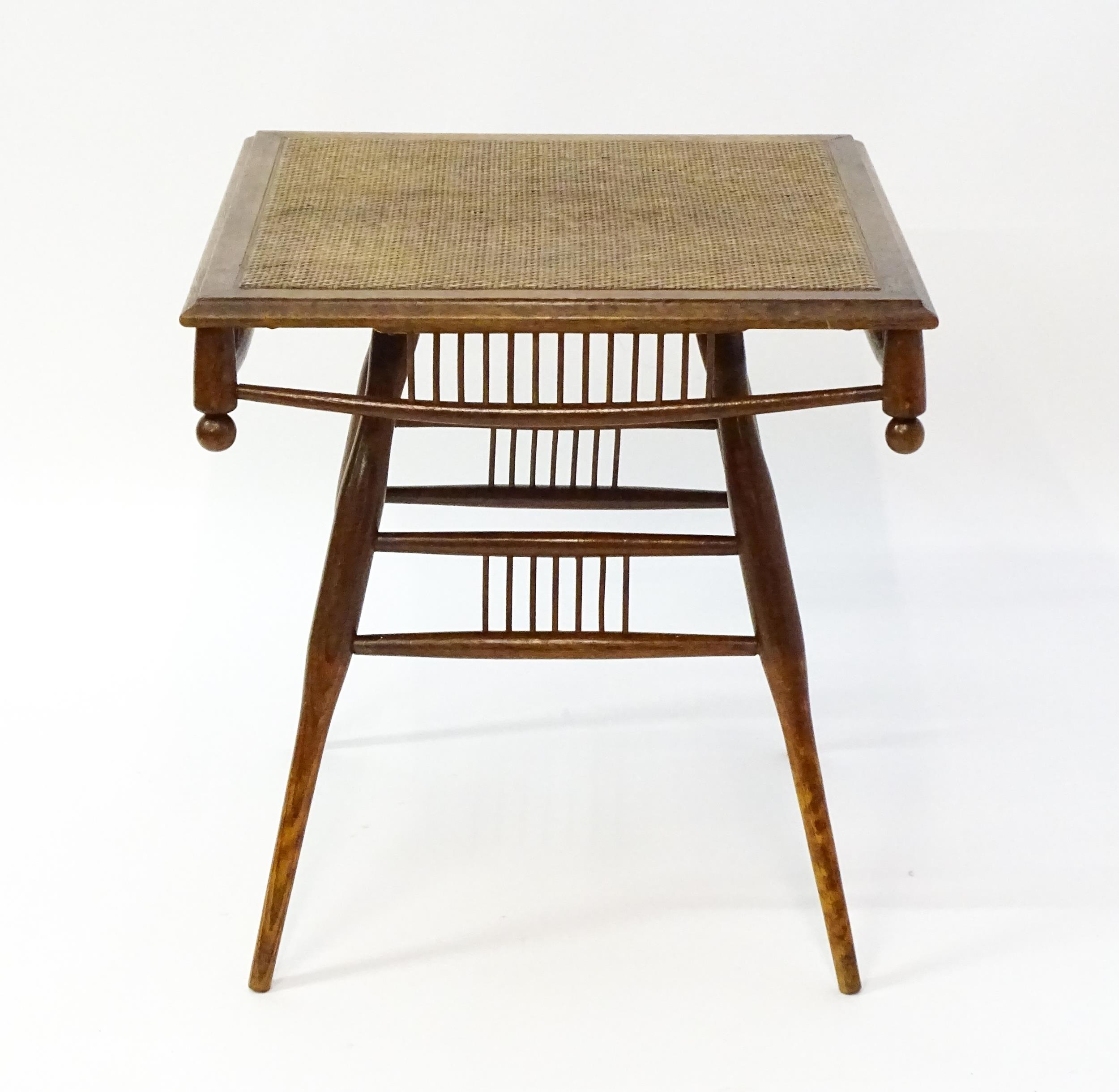 An unusual late 19thC Arts & Crafts table with a rattan inlaid moulded top above three tiers of - Bild 5 aus 10