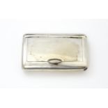 A silver snuff box hallmarked Birmingham 1917, maker John Collard Vickery. Approx. 1 3/4" wide