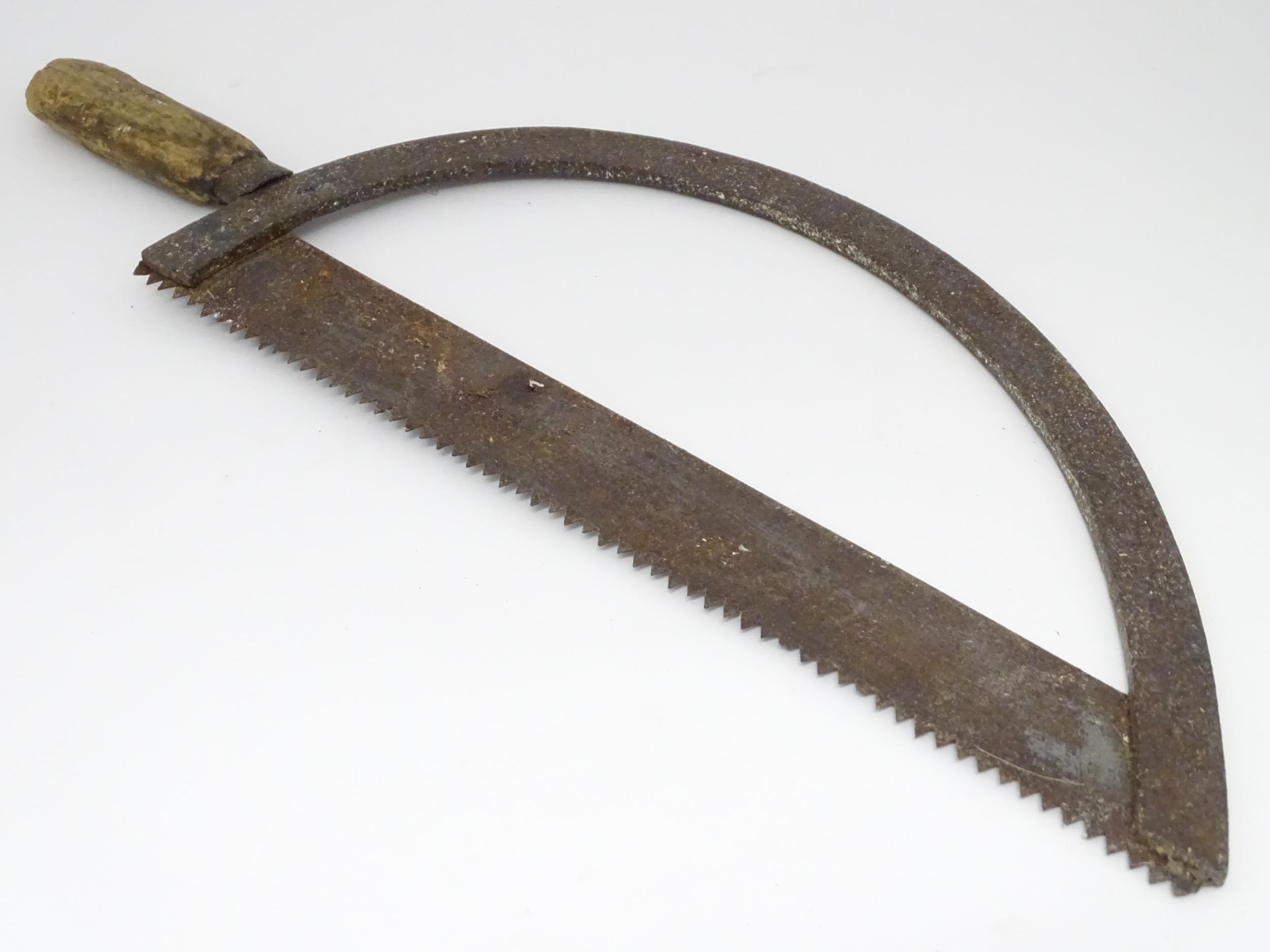 A 19thC bow saw , with arc frame and wooden handle, approx 23" long Please Note - we do not make - Image 3 of 6