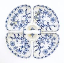 A Continental blue and white hors d'oeuvre dish decorated in the Onion pattern with four sections
