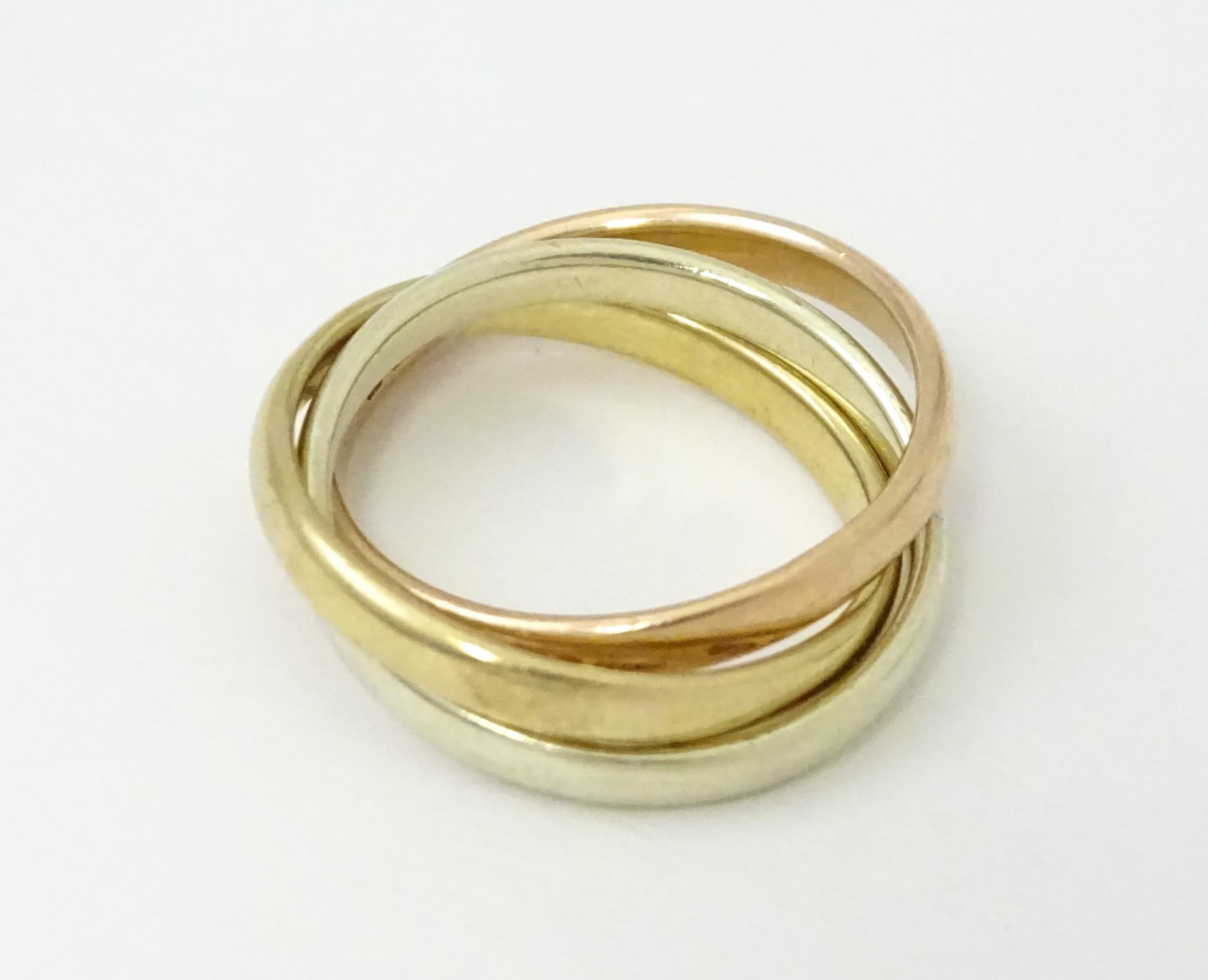 A 9ct tri-gold Russian wedding ring. Ring size approx. G 1/2 Please Note - we do not make - Image 2 of 8