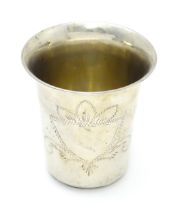 A .800 silver beaker with engraved decoration. Possibly Israeli. Approx. 2 1/2" high Please Note -