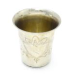 A .800 silver beaker with engraved decoration. Possibly Israeli. Approx. 2 1/2" high Please Note -