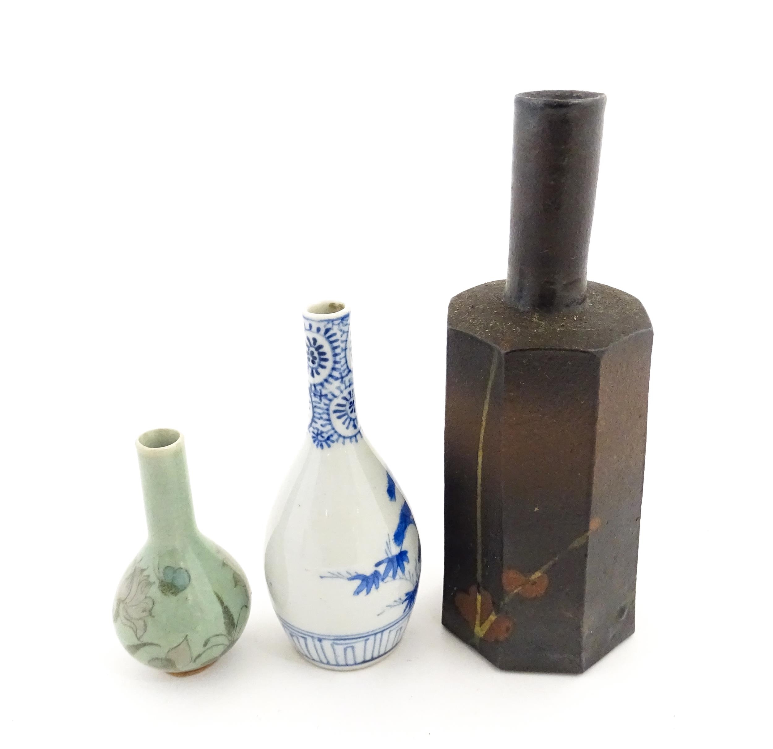A Japanese studio pottery vase with octagonal body, elongated neck and brushwork detail. Together - Image 6 of 7