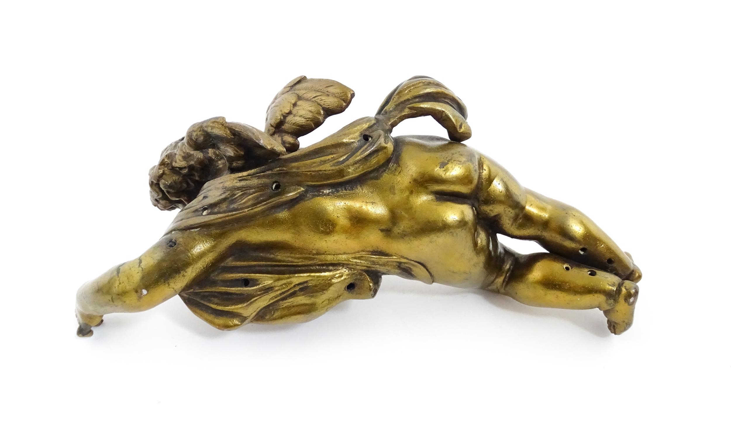 A 20thC cast model of a winged putto / cherub. Approx. 11" long Please Note - we do not make - Image 2 of 6