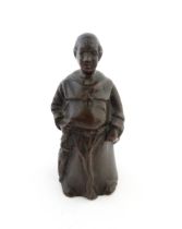 An early 20thC cast brass table bell modelled as a monk. Approx. 5" high Please Note - we do not