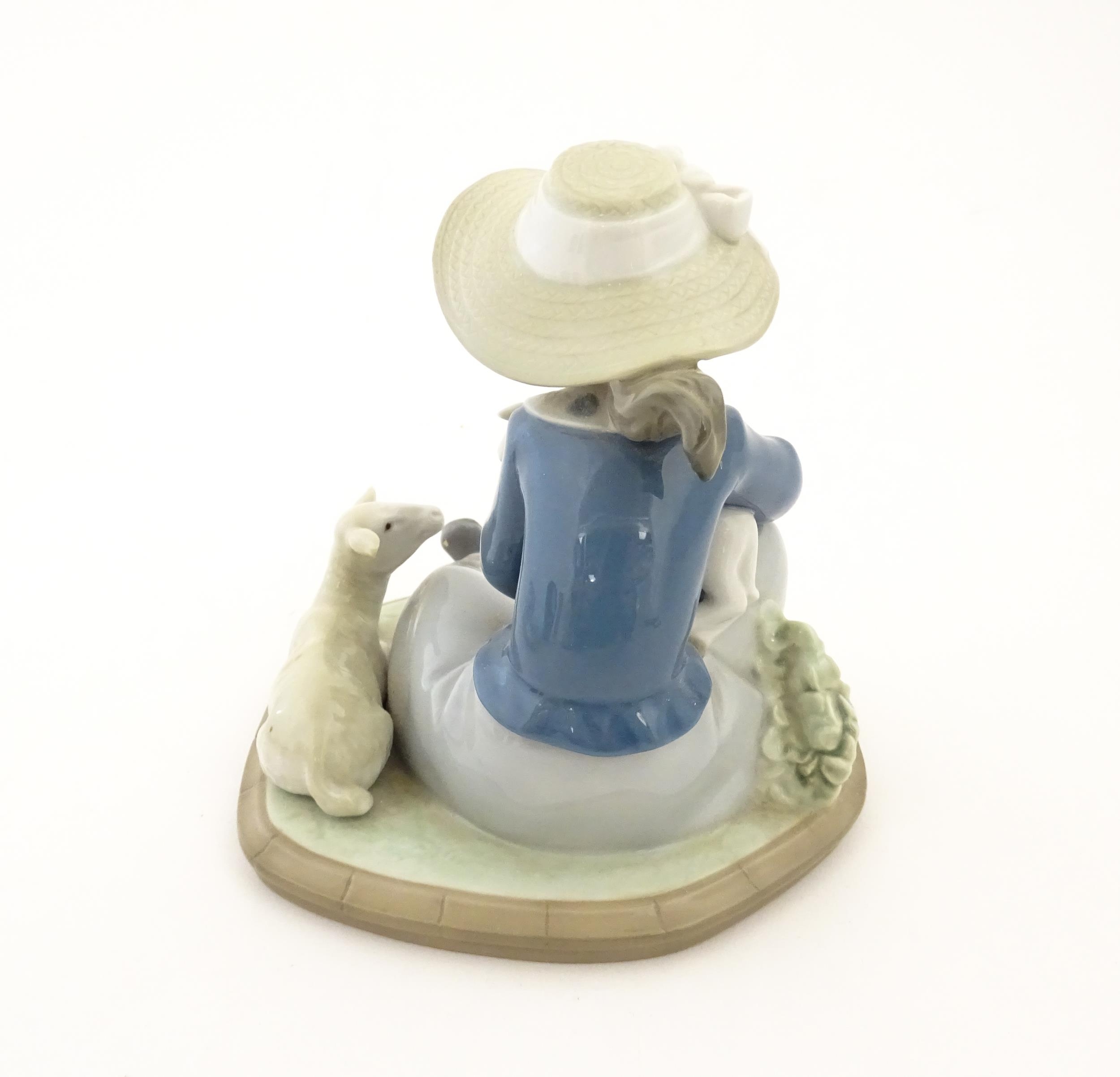 A Lladro model Lambkins, model no. 5469. Marked under. With box. Approx. 5 3/4" high Please Note - - Image 5 of 8