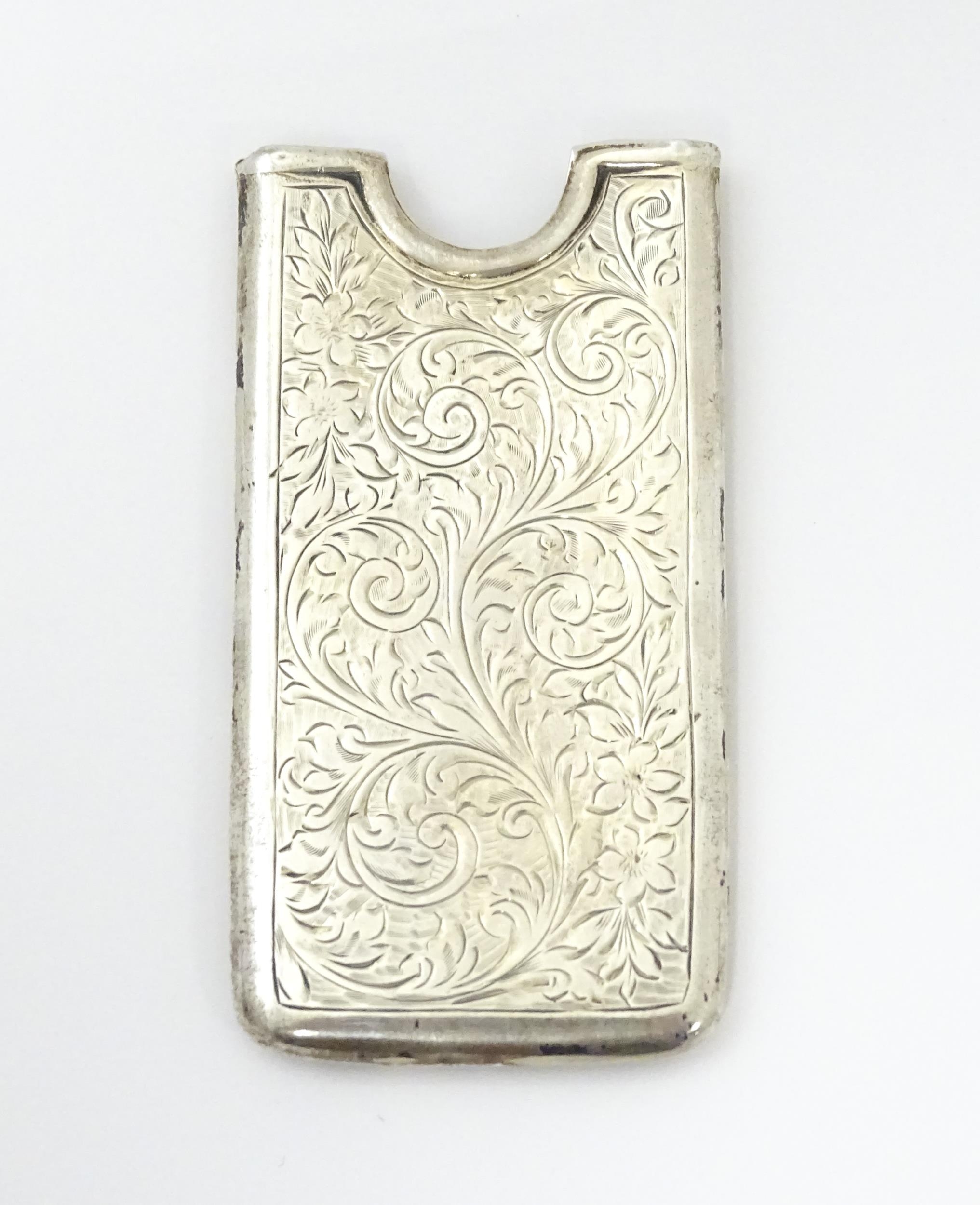 A silver card case with engraved decoration, hallmarked Birmingham c. 1906, maker George Bowen & - Image 6 of 6