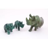 Ethnographic / Native / Tribal : Two 20thC carved malachite style animals comprising a rhino and