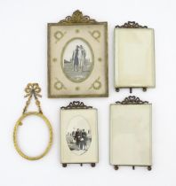 A quantity of early 20thC photograph frames with gilt metal crested detail. Largest approx. 9 1/2"