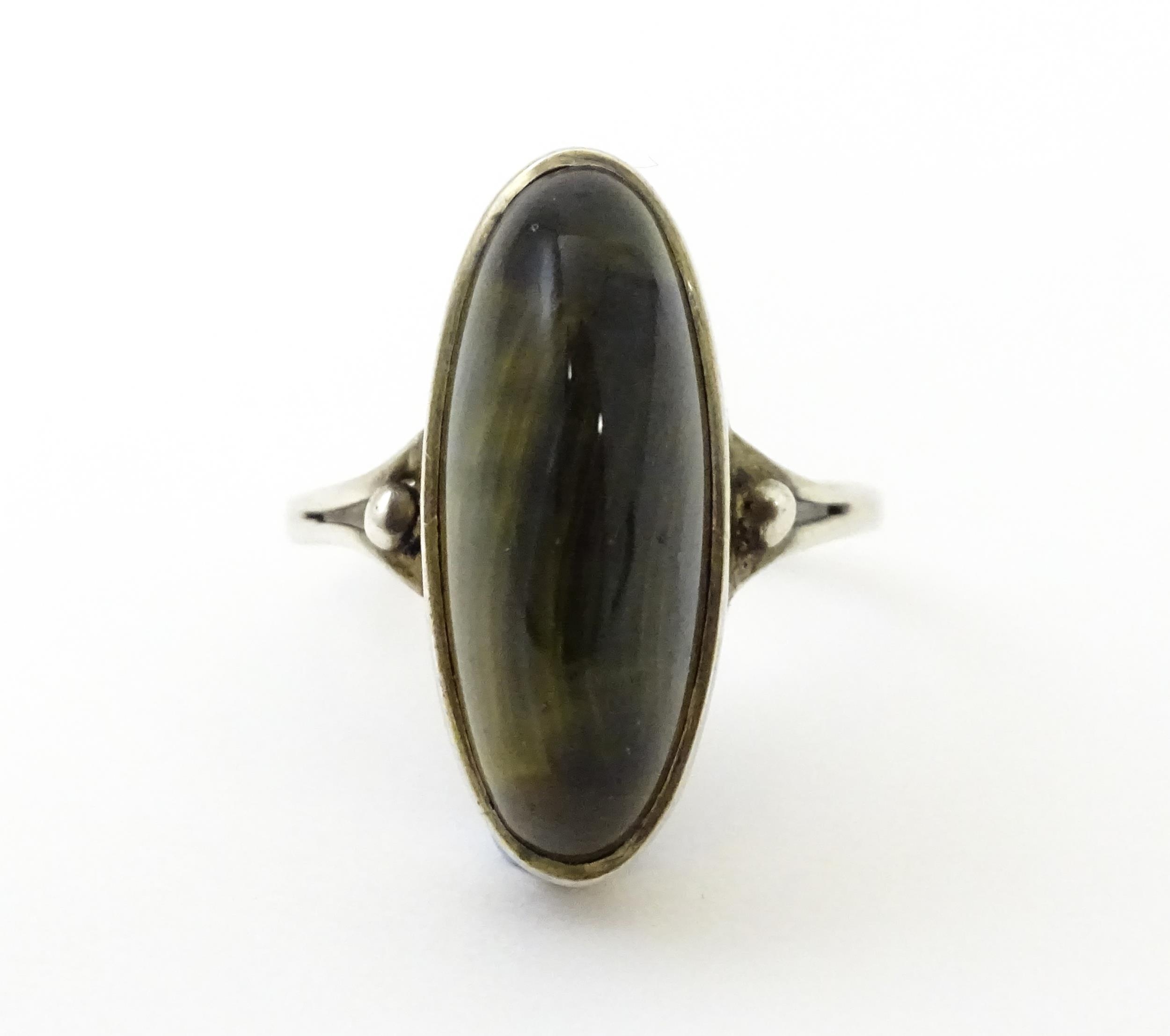 A silver ring set with cabochon. Ring size approx. S Please Note - we do not make reference to the - Image 3 of 8