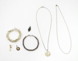 A quantity of assorted jewellery to include silver and white metal bracelets, silver chain