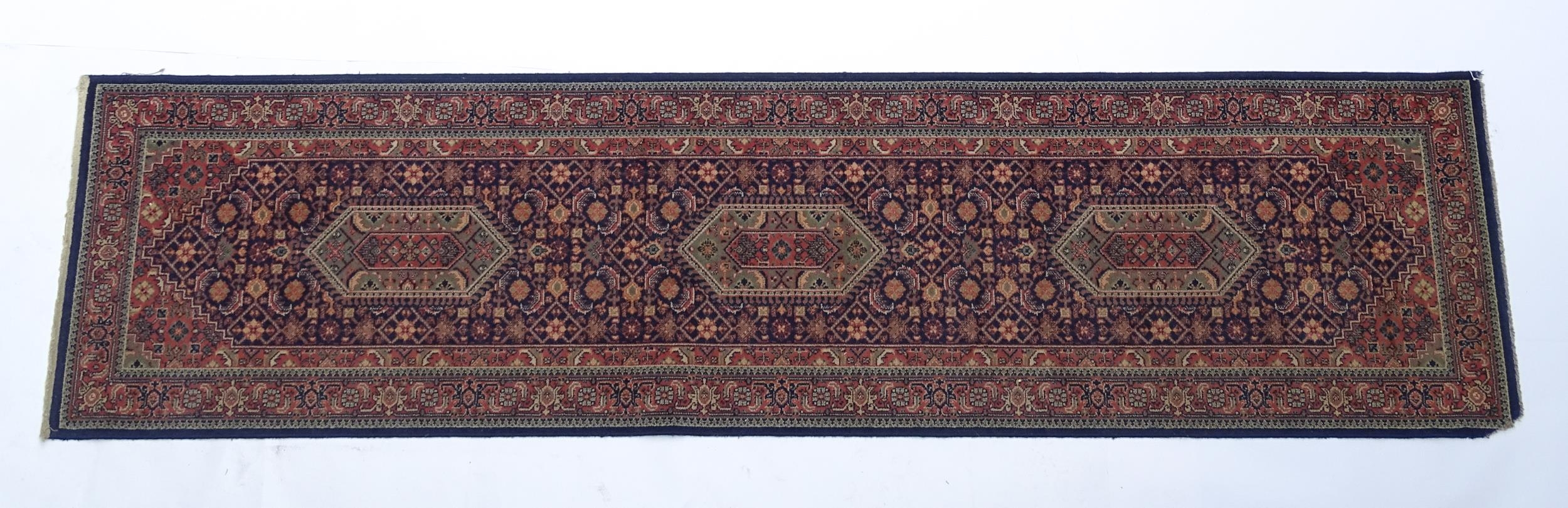 Carpet / Rug : A blue ground runner decorated with three central medallions with floral and scroll - Image 3 of 8