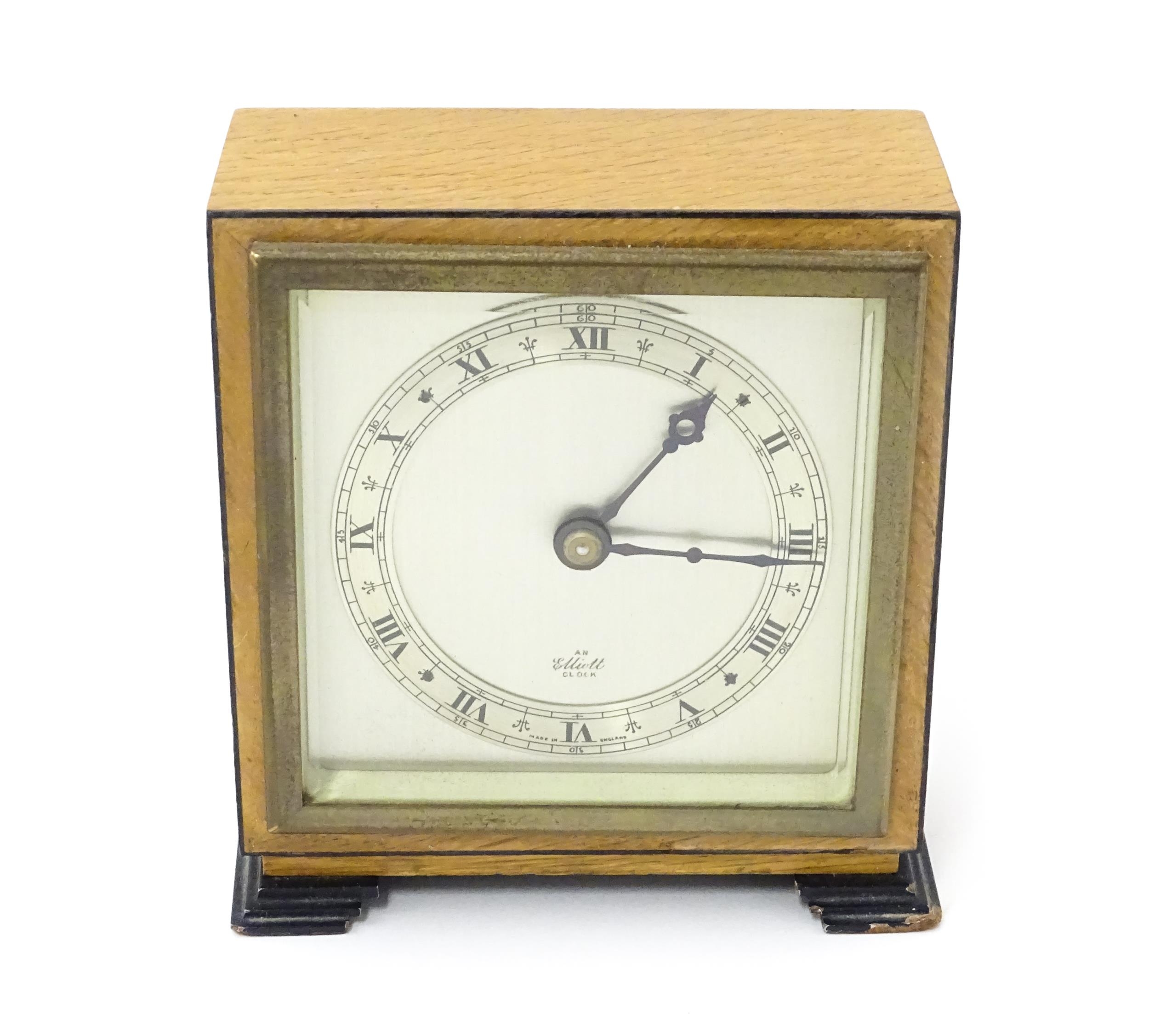 A 20thC mantle clock by Elliott. the dial with Roman numeral chapter ring and signed ' An Elliott - Image 3 of 8