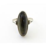 A silver ring set with cabochon. Ring size approx. S Please Note - we do not make reference to the
