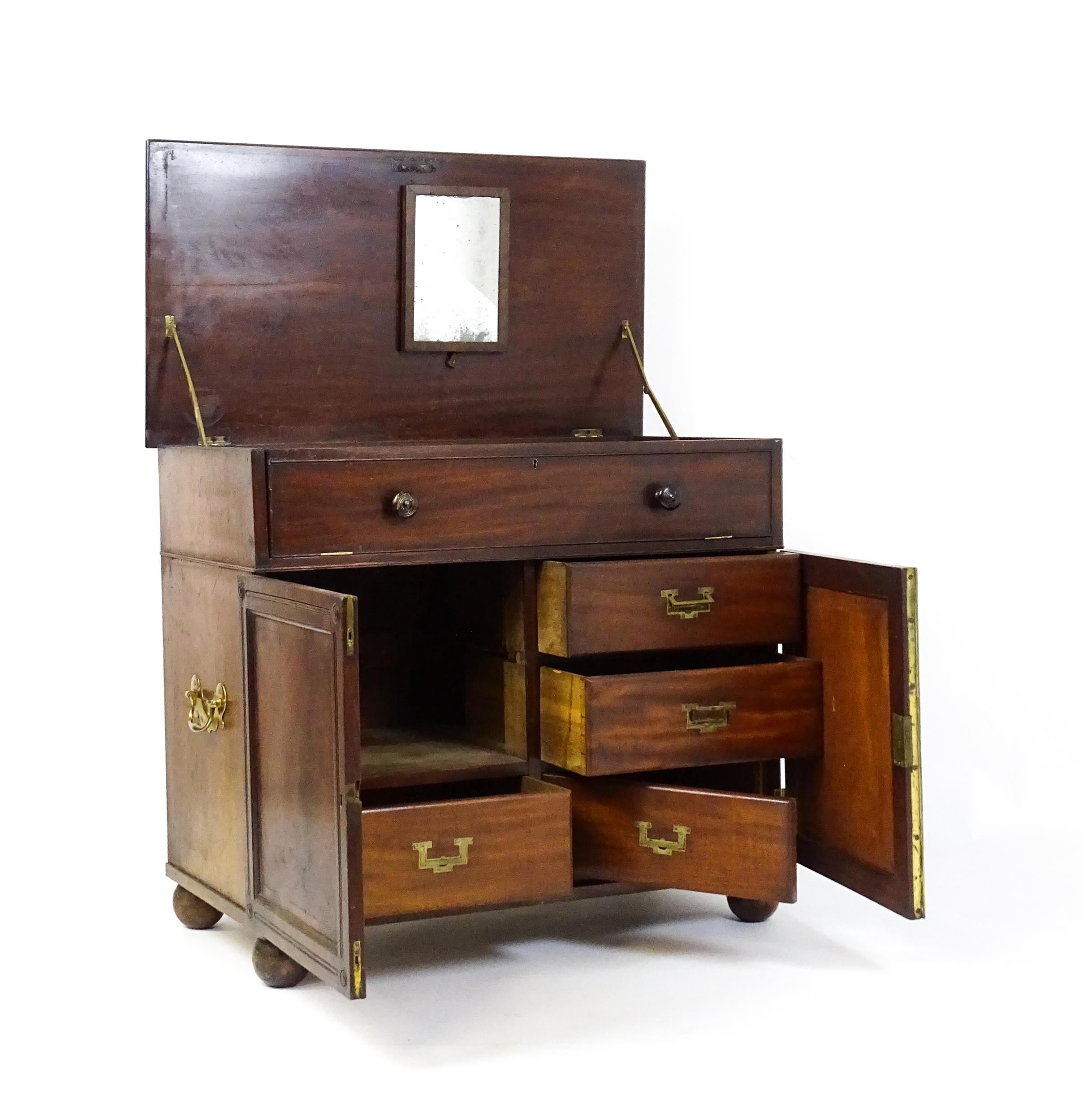 A Georgian mahogany campaign washstand with a mirror to the interior and sections for internal - Image 3 of 11