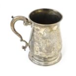 A Geo II silver tankard / mug with engraved heraldic armorial coat of arms decoration hallmarked