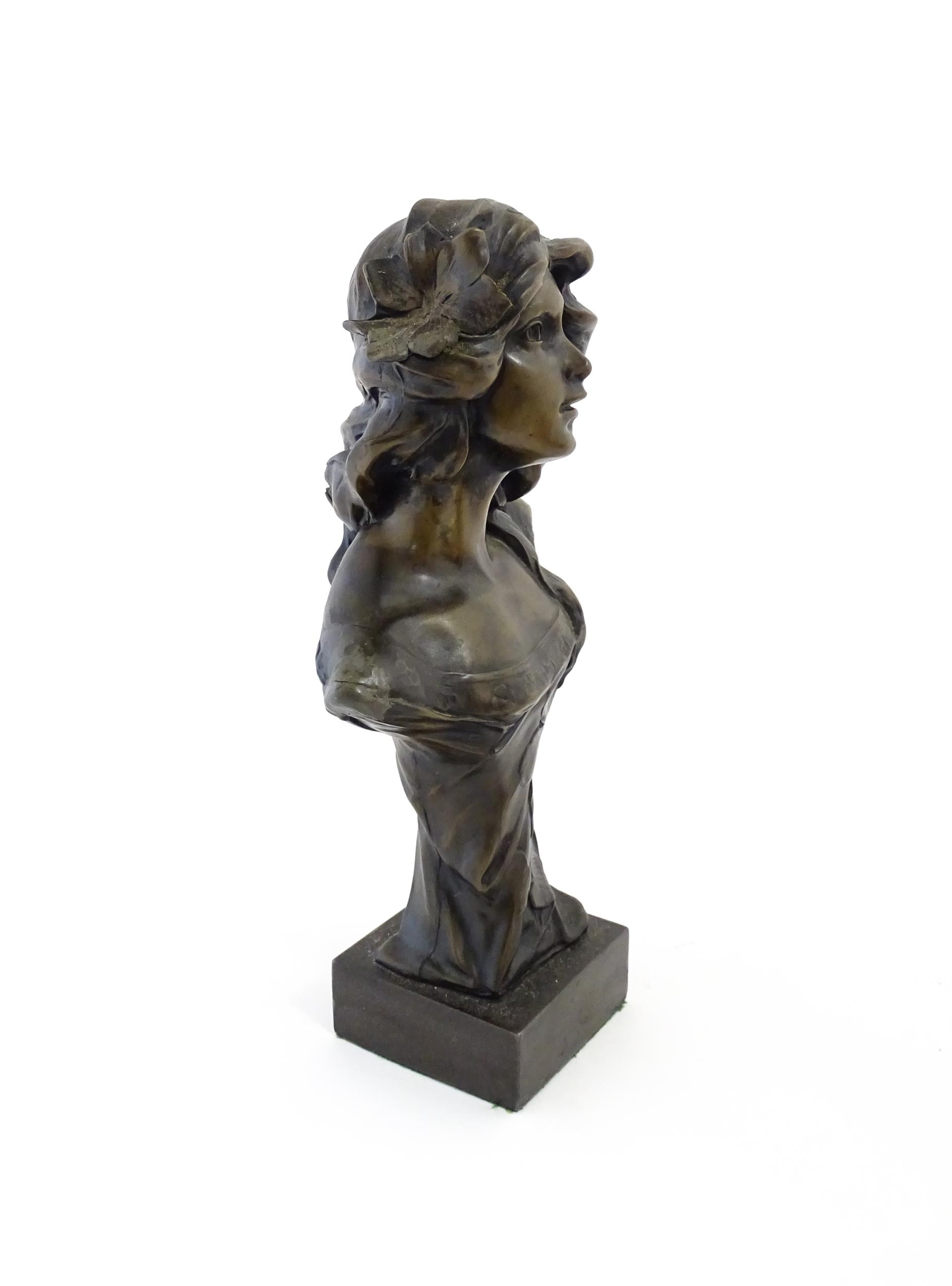 A 20thC cast bust depicting an young lady in the Art Nouveau style after Emmanuel Villanis. - Image 4 of 7