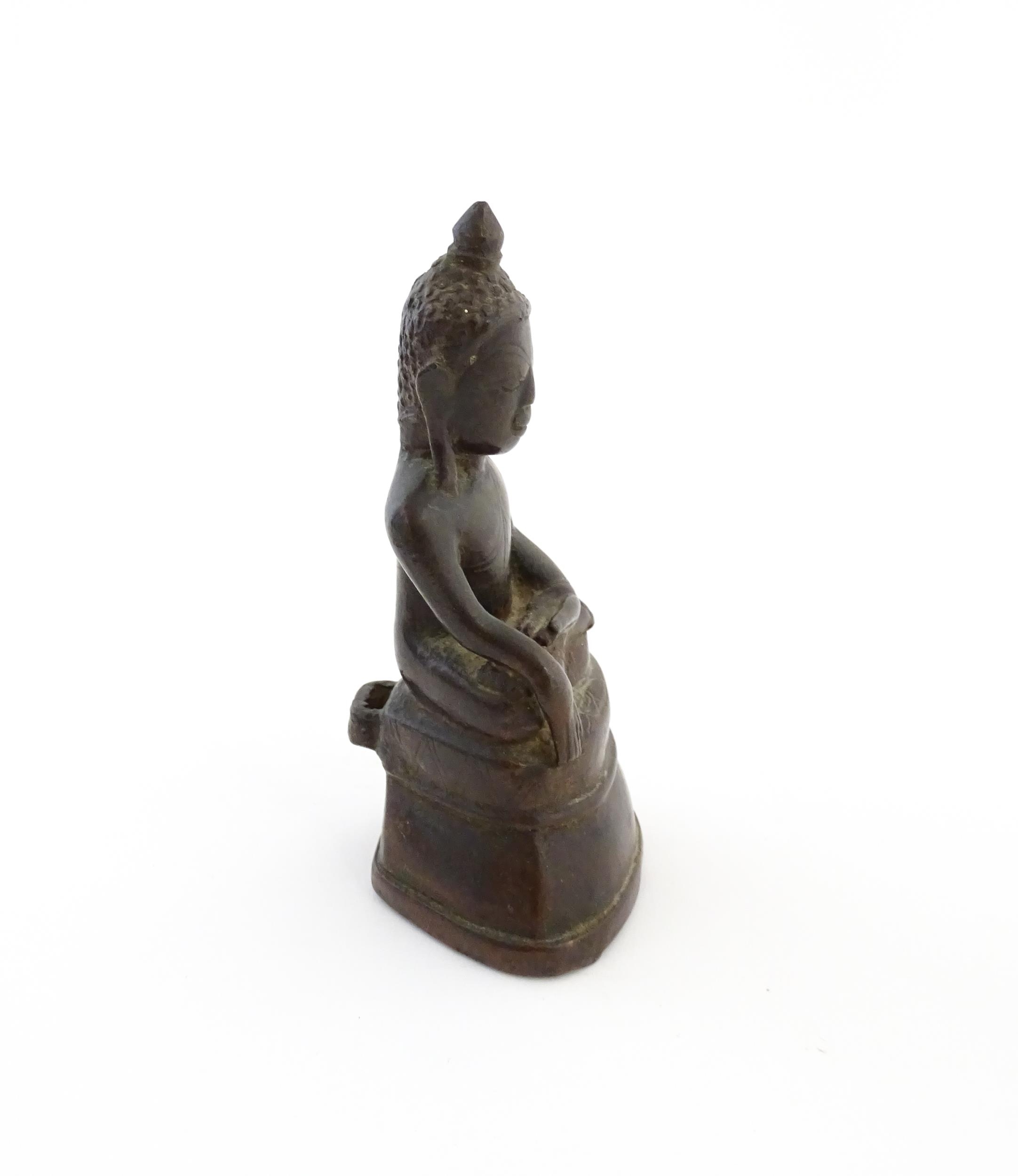 An Asian cast sculpture modelled as a seated Buddha. Approx. 5" high Please Note - we do not make - Image 5 of 6