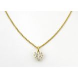 An 18ct gold necklace with heart shaped pendant set with a profusion of diamonds. Approx. 16" long