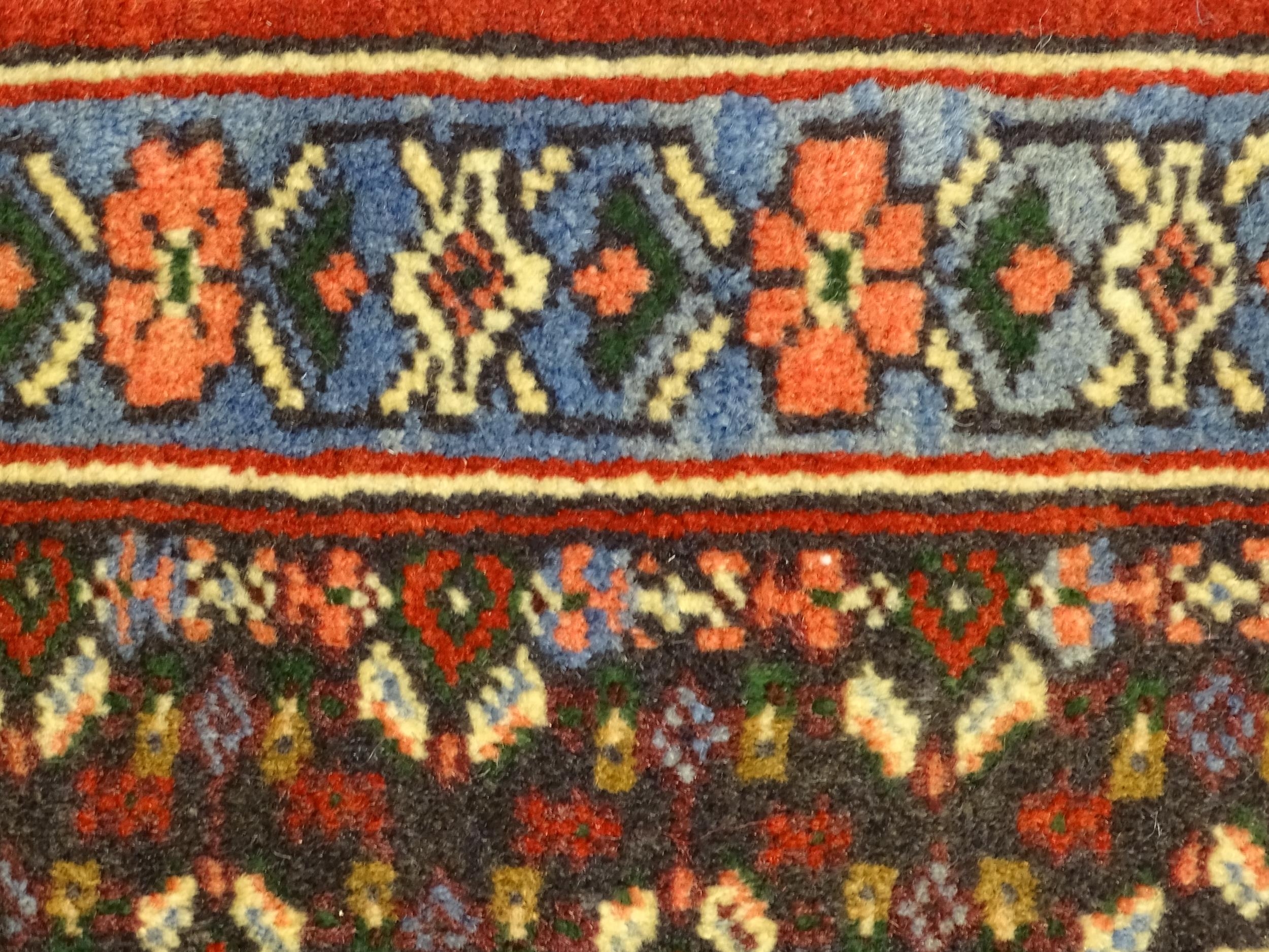 Carpet / Rug : A North West Persian Senneh runner with a red ground decorated with central repeating - Image 9 of 9