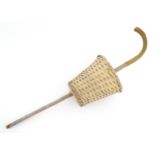 A mid 20thC foraging stick / mushroom picker, with woven basket, approx 38" long Please Note - we do