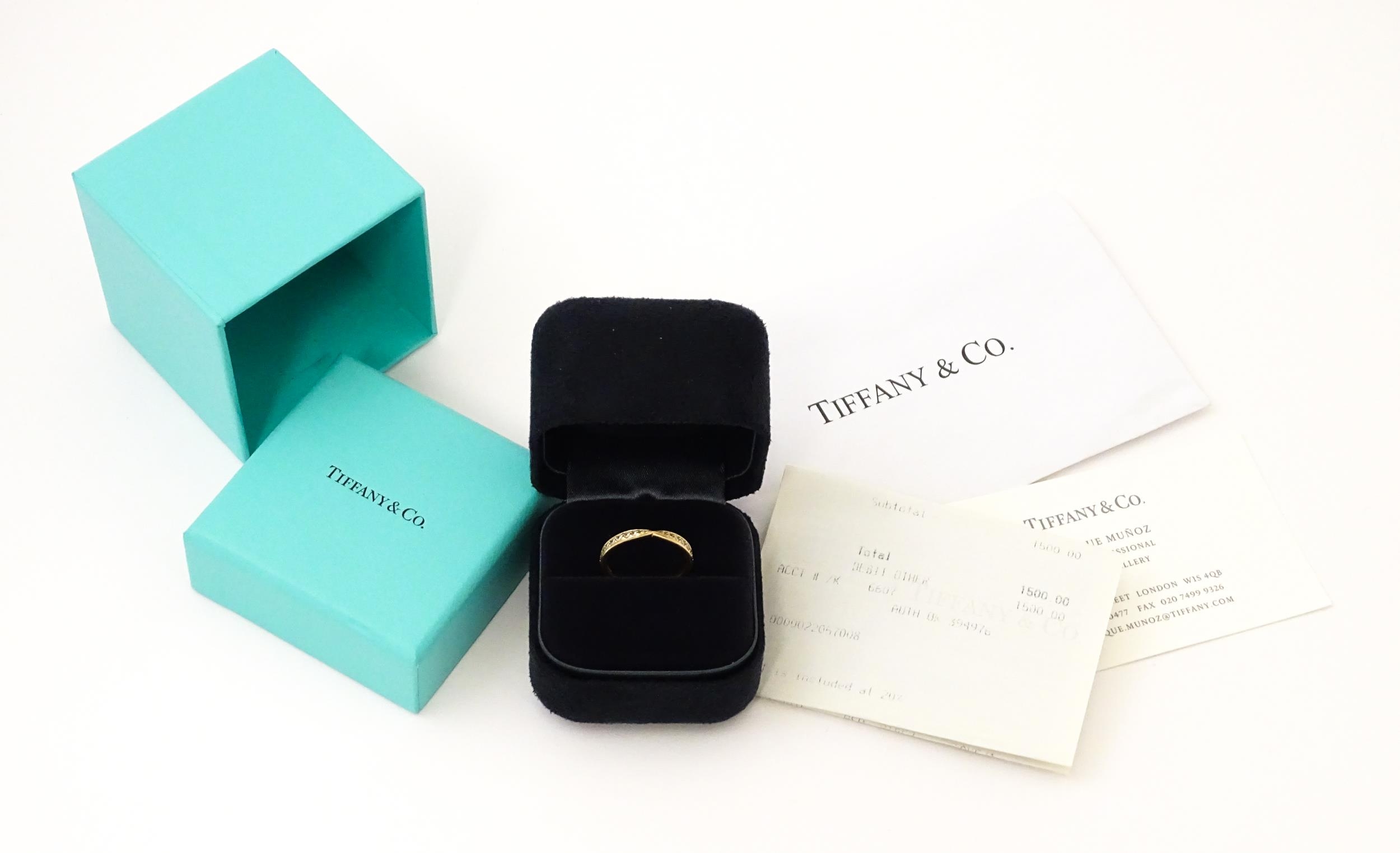 An 18ct gold Tiffany ring set with diamonds. Ring size approx M Please Note - we do not make - Image 7 of 8