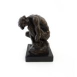 A 20thC cast bronze model of a crouching male nude. In the manner of Rodin. Approx. 8 1/4" high